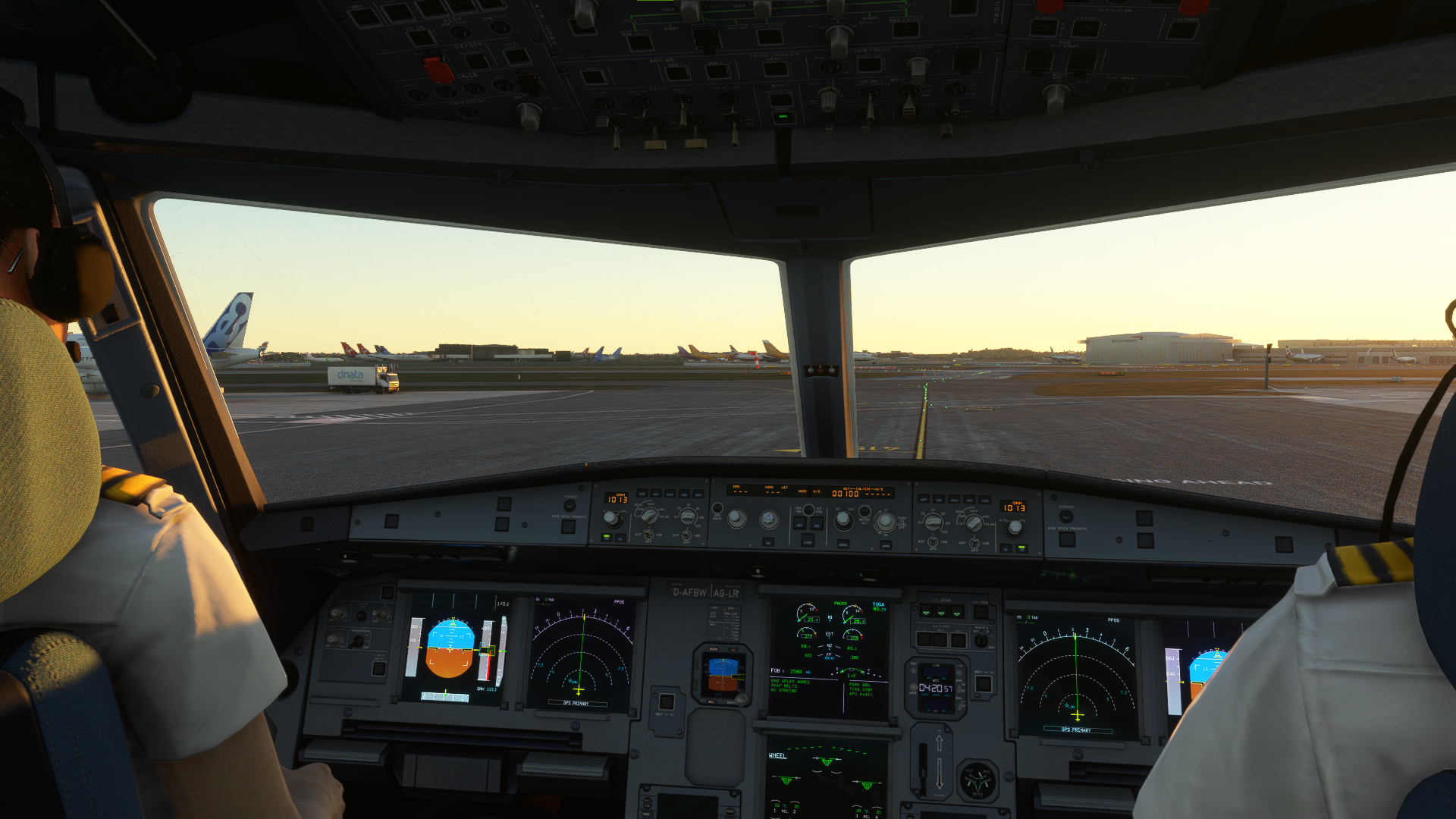 View from an airliner cockpit on an airport apron in Microsoft Flight Simulator